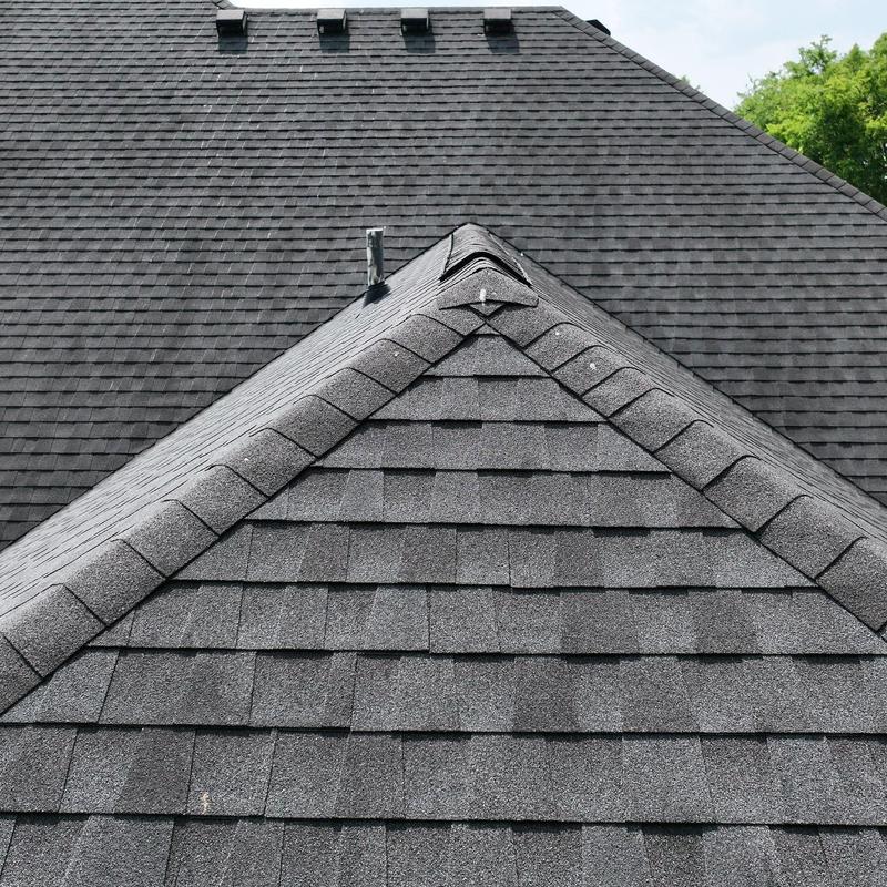 Asphalt shingle roof with minor hail and wind damage