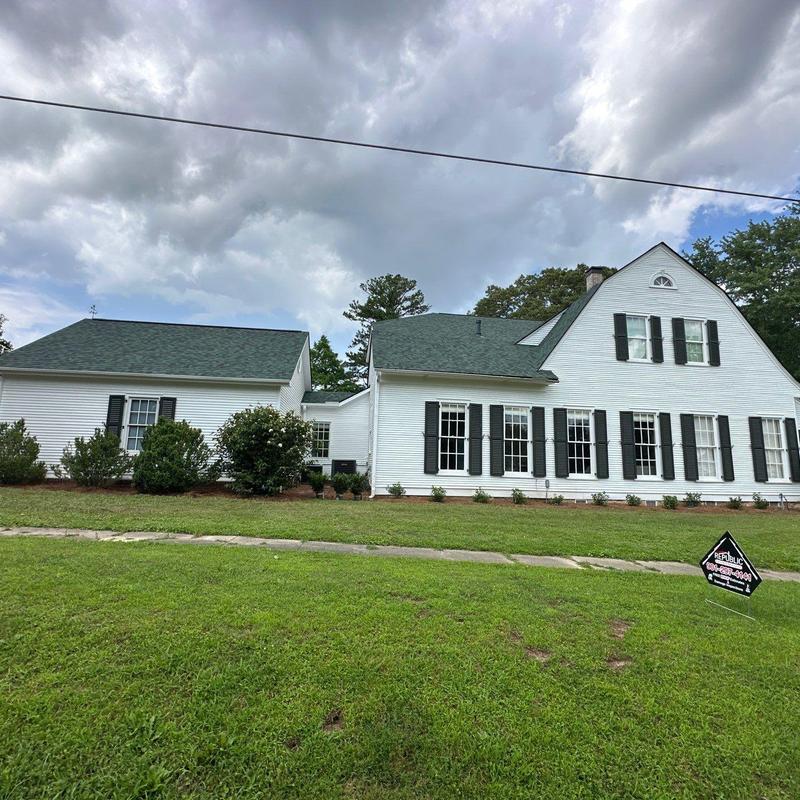 Owens Corning Duration asphalt shingle roof on white house