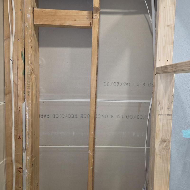 Shower wall framing and plumbing rough-in in bathroom remodel Shower wall framing and plumbing rough-in in bathroom remodel