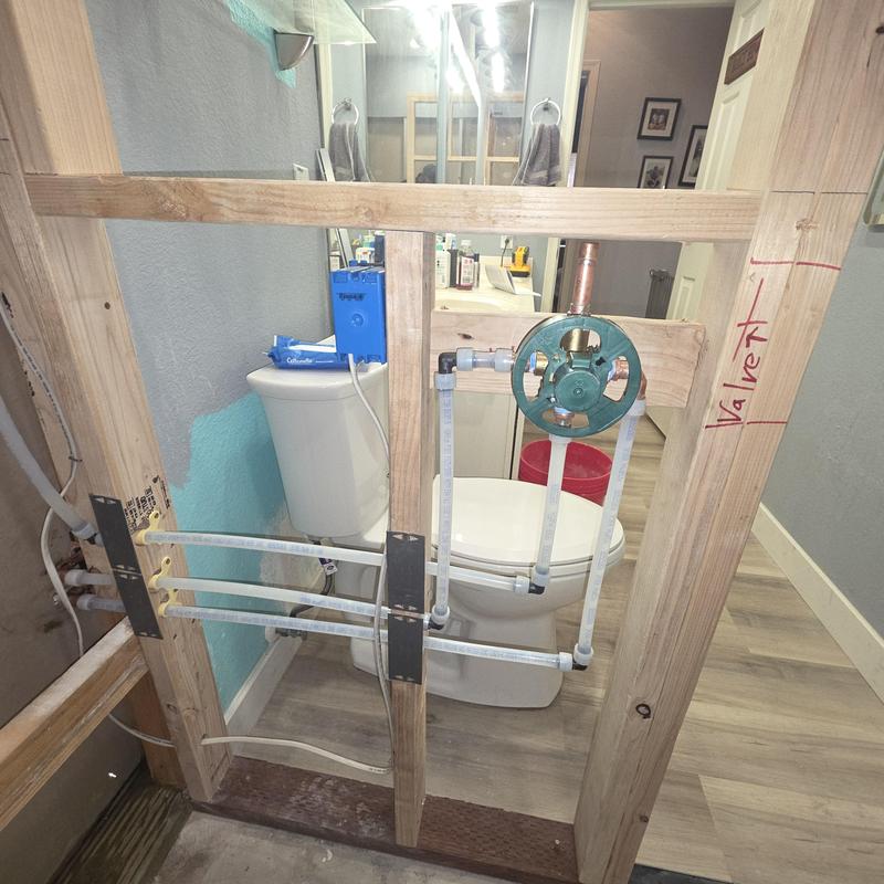 Shower valve and piping installation behind wall frame Shower valve and piping installation behind wall frame