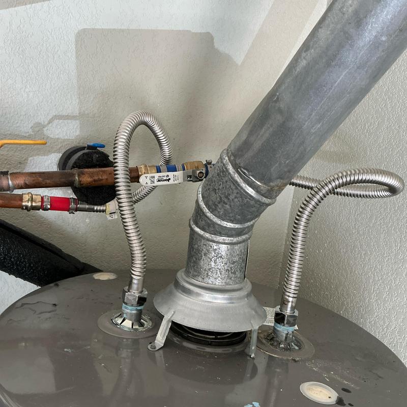Water heater flex supply lines and ball valve installed