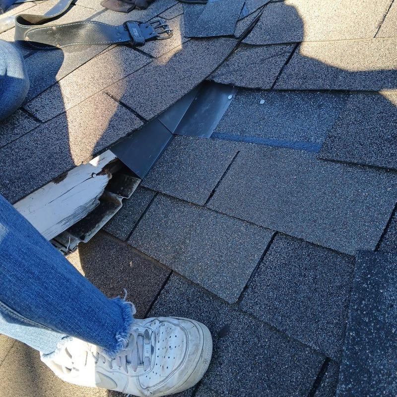 Step flashing installation on asphalt shingle roof