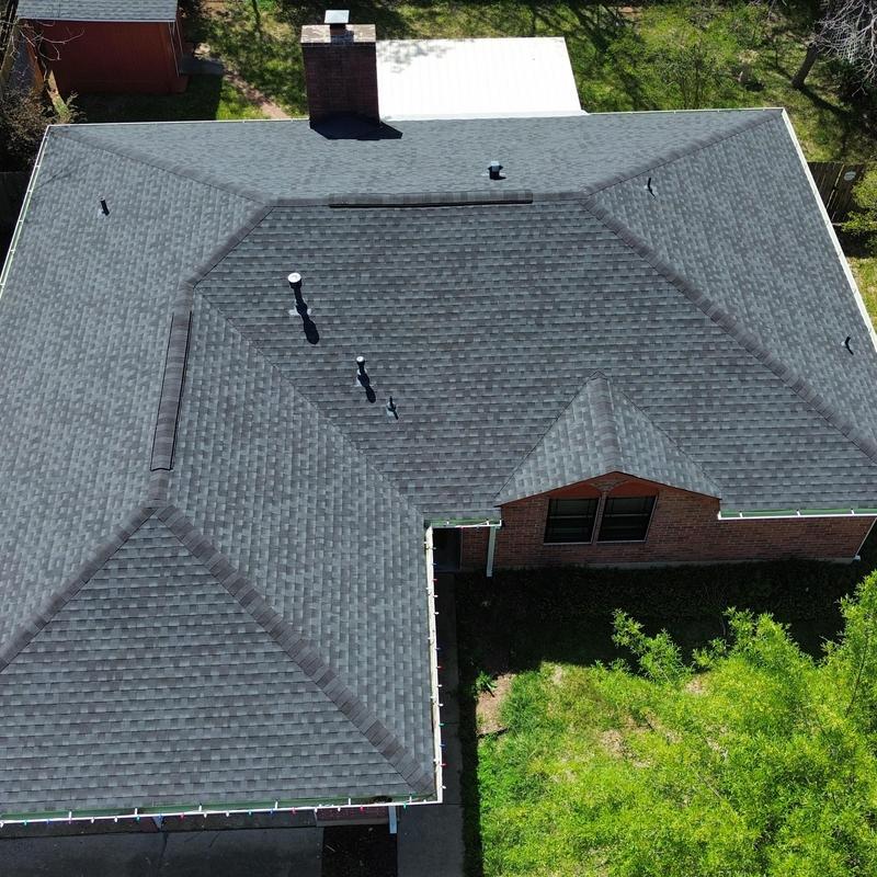 GAF charcoal asphalt shingle roof with ridge vent GAF charcoal asphalt shingle roof with ridge vent
