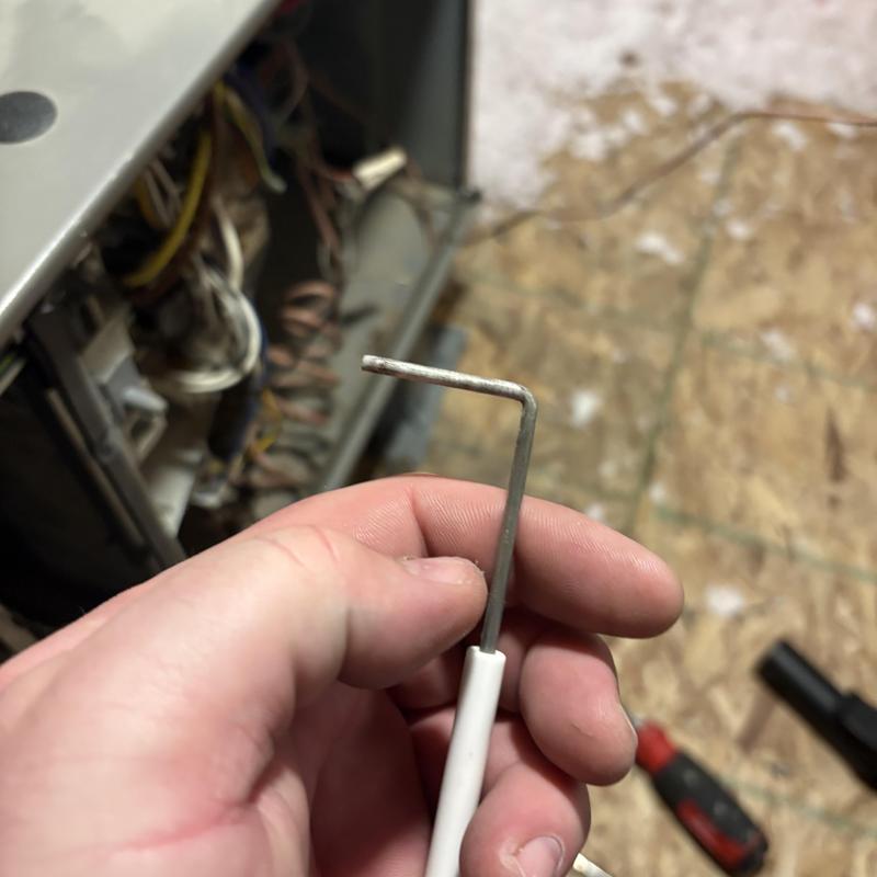 Furnace flame sensor cleaning tool in hand Furnace flame sensor cleaning tool in hand