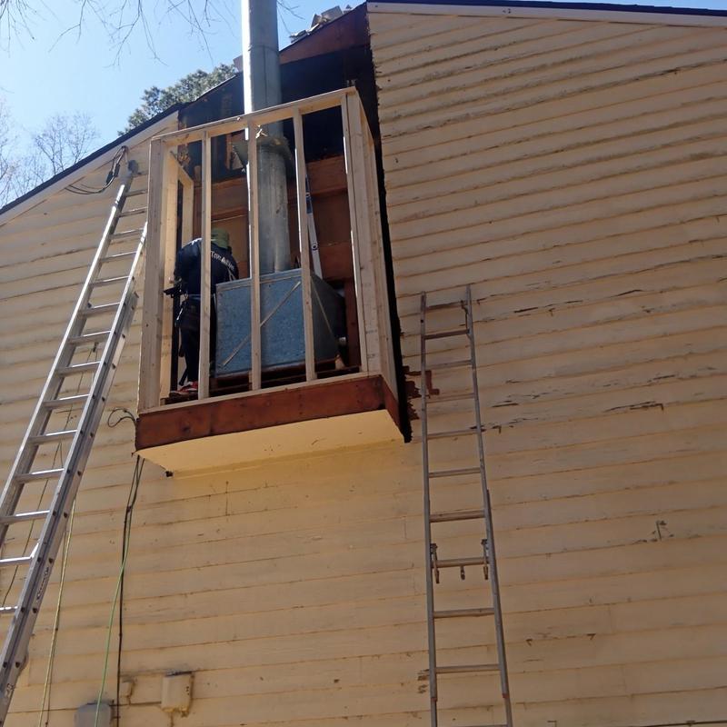Chimney reframing and siding replacement work