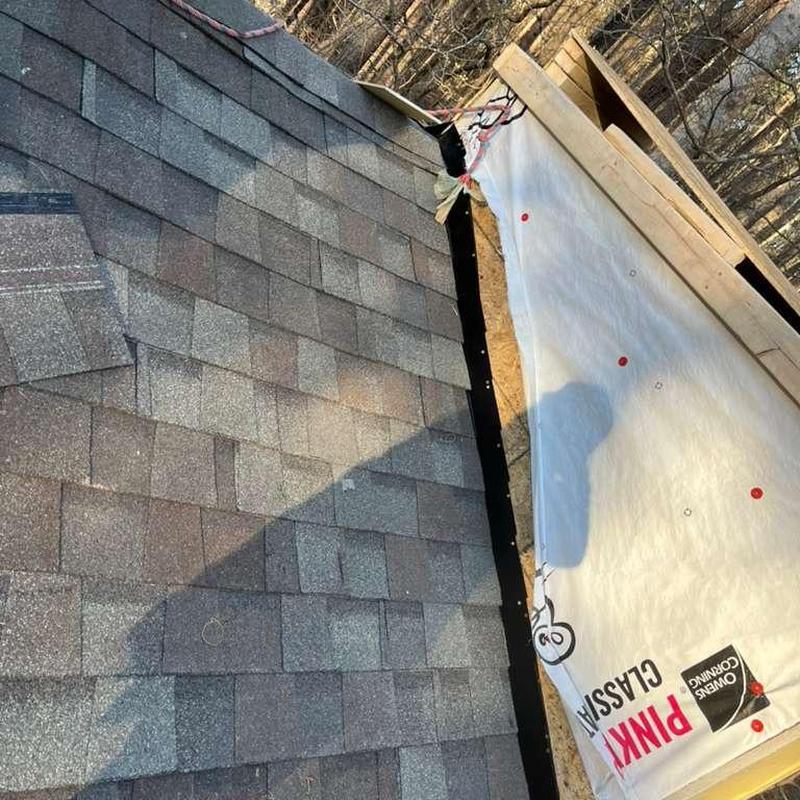 Roof shingles and chimney flashing installation