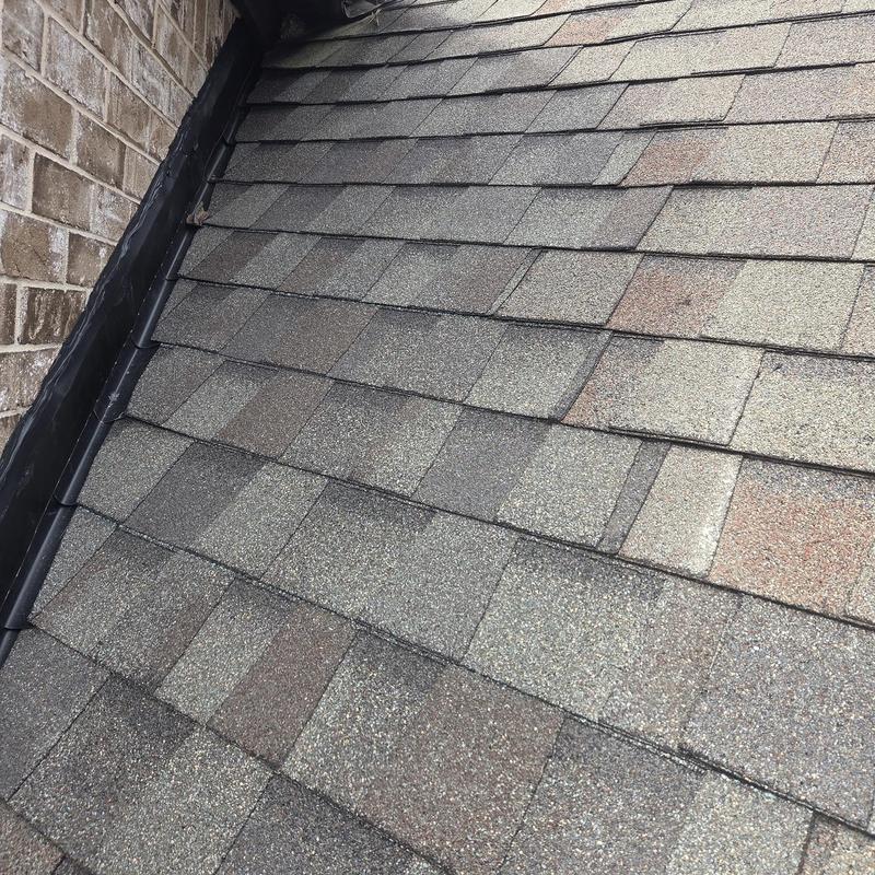 Roof shingles near wall flashing and pipe boots replacement