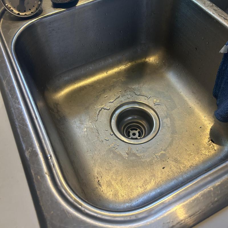 Kitchen sink drain cleared, stainless steel basin