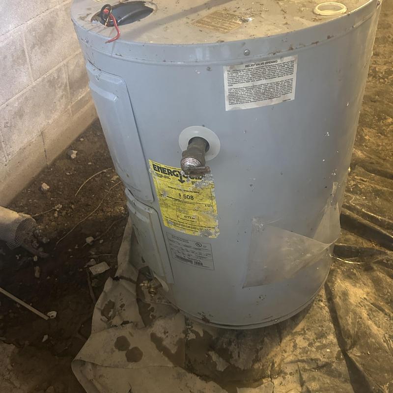 Lowboy electric water heater leaking before replacement