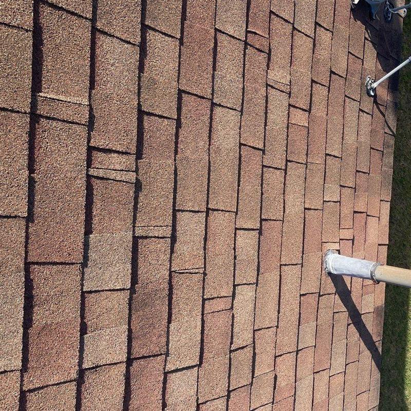 Owens Corning shingle roof with minor damage