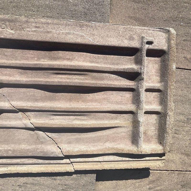 Concrete roof tile with crack and damage detail