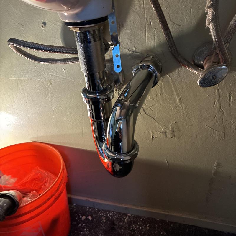 Bathroom sink P-trap and pop-up drain assembly installation