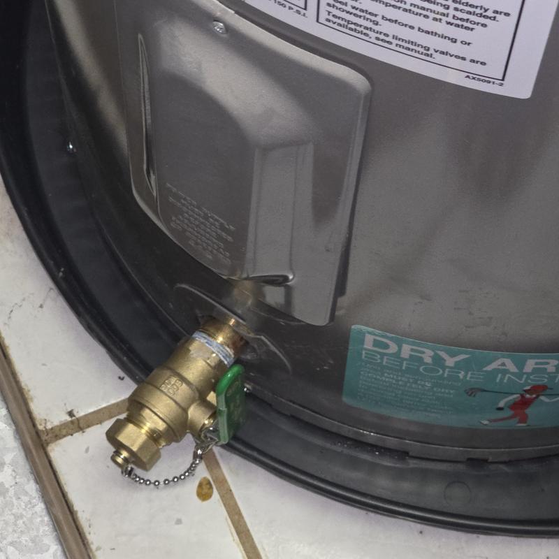 Water heater drain valve with new anode rod Water heater drain valve with new anode rod