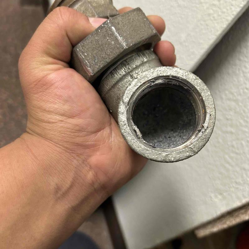 Frozen gate valve close-up showing internal corrosion