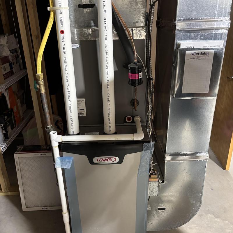 Lennox gas furnace blower with PVC piping and ducts