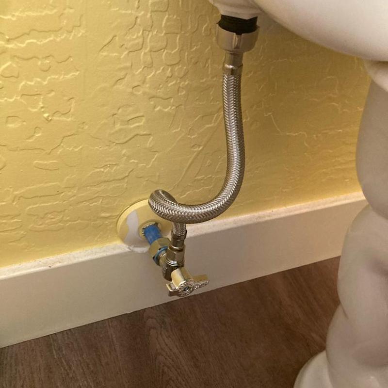 Toilet angle stop valve with braided water line installed Toilet angle stop valve with braided water line installed