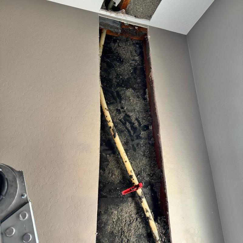 PEX water line with valve inside opened wall cavity
