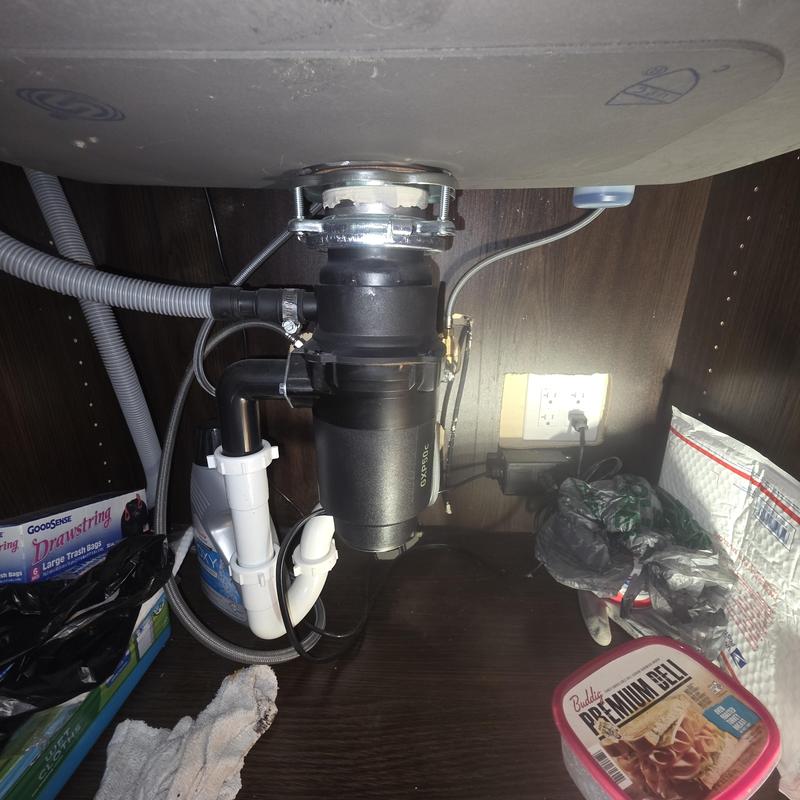 Garbage disposal unit under kitchen sink installation Garbage disposal unit under kitchen sink installation