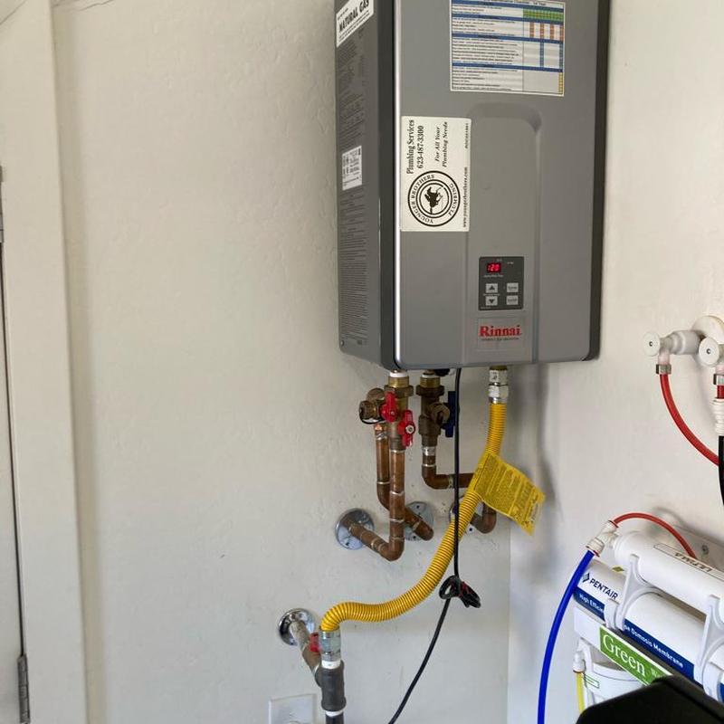 Tankless water heater with piping and filters