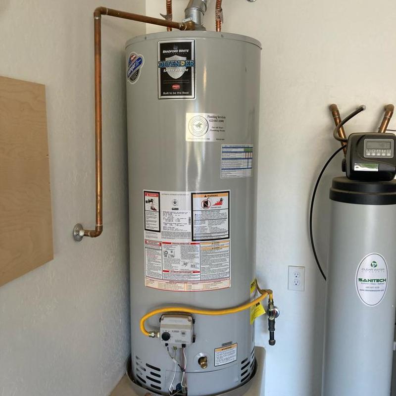 50 gallon water heater with copper piping in home