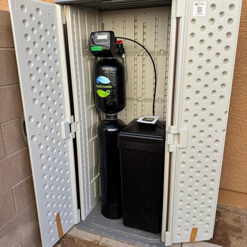 Green Fusion 1000 water softener in outdoor shed