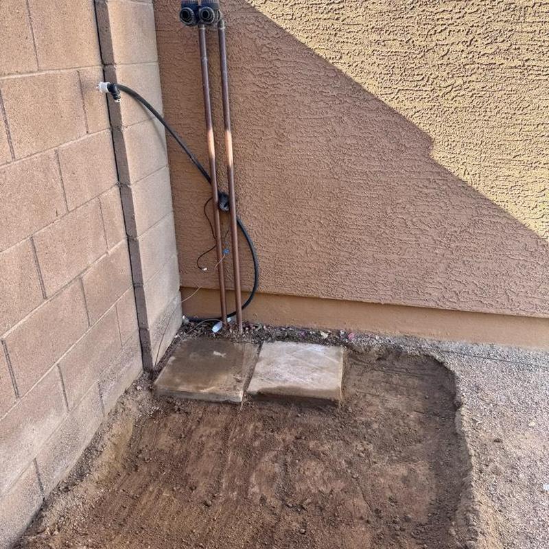 Water softener base with level concrete blocks outdoors