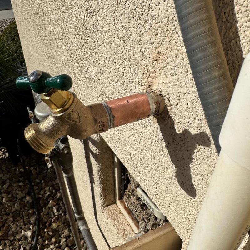 Hose bib with copper pipe replacement on home exterior