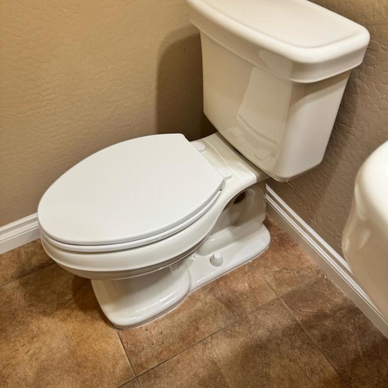 Toilet with new wax ring and silicone seal installed Toilet with new wax ring and silicone seal installed