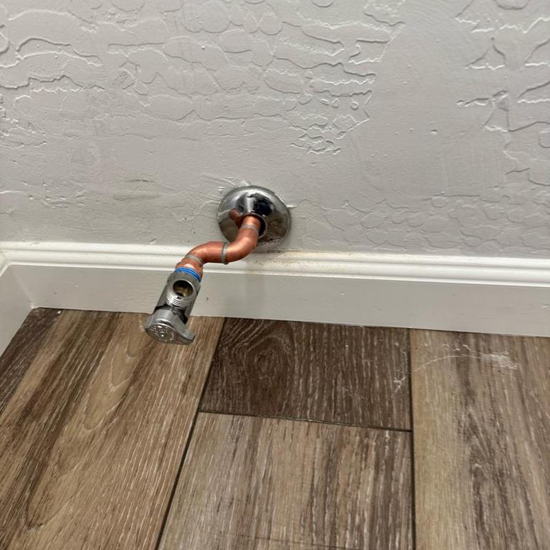 Copper toilet angle stop with new fitting installation Copper toilet angle stop with new fitting installation