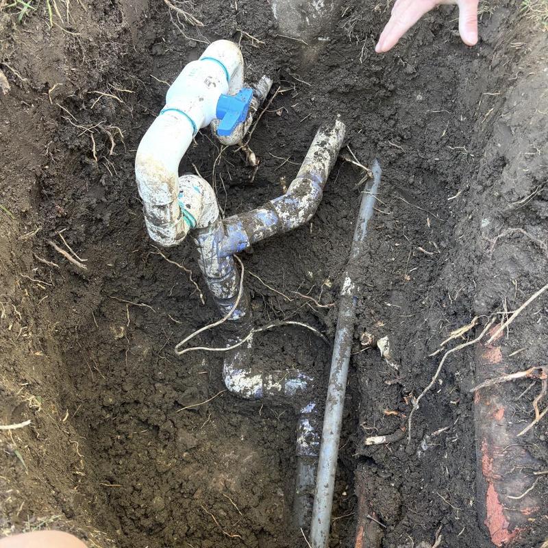2-inch irrigation pipe with valve in soil excavation