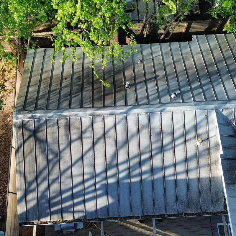 Standing seam metal roof inspection with vents visible Standing seam metal roof inspection with vents visible