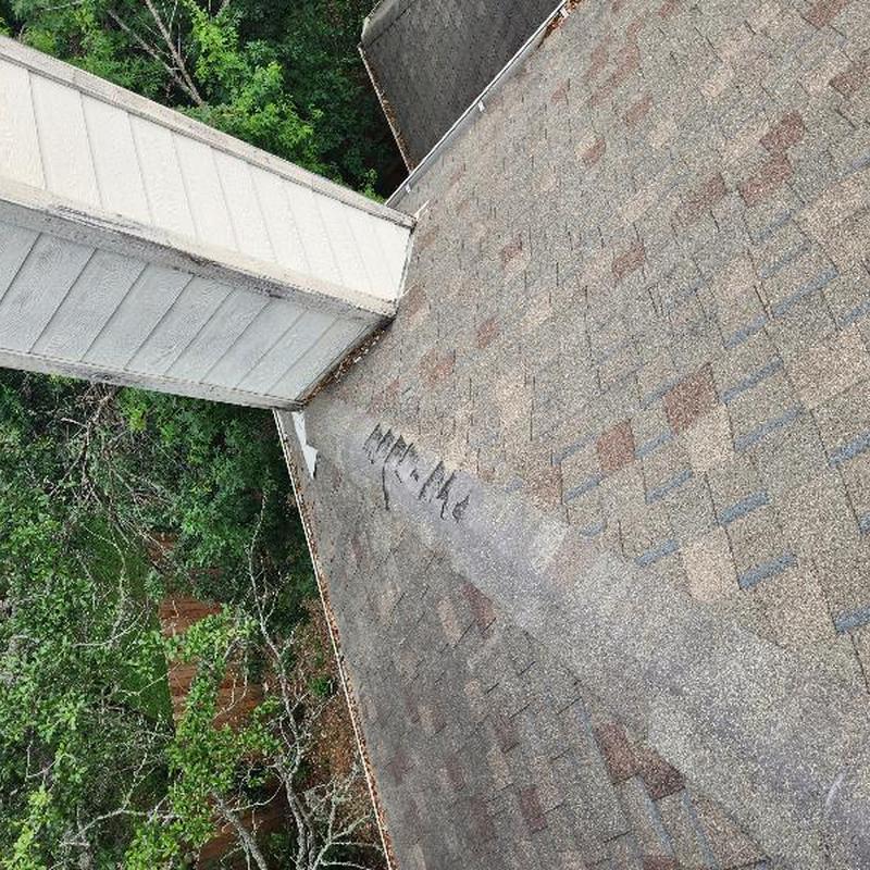 OC driftwood shingles with missing patch near chimney