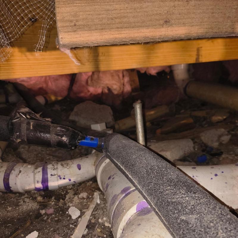 Crawlspace piping with insulation and debris cleanup