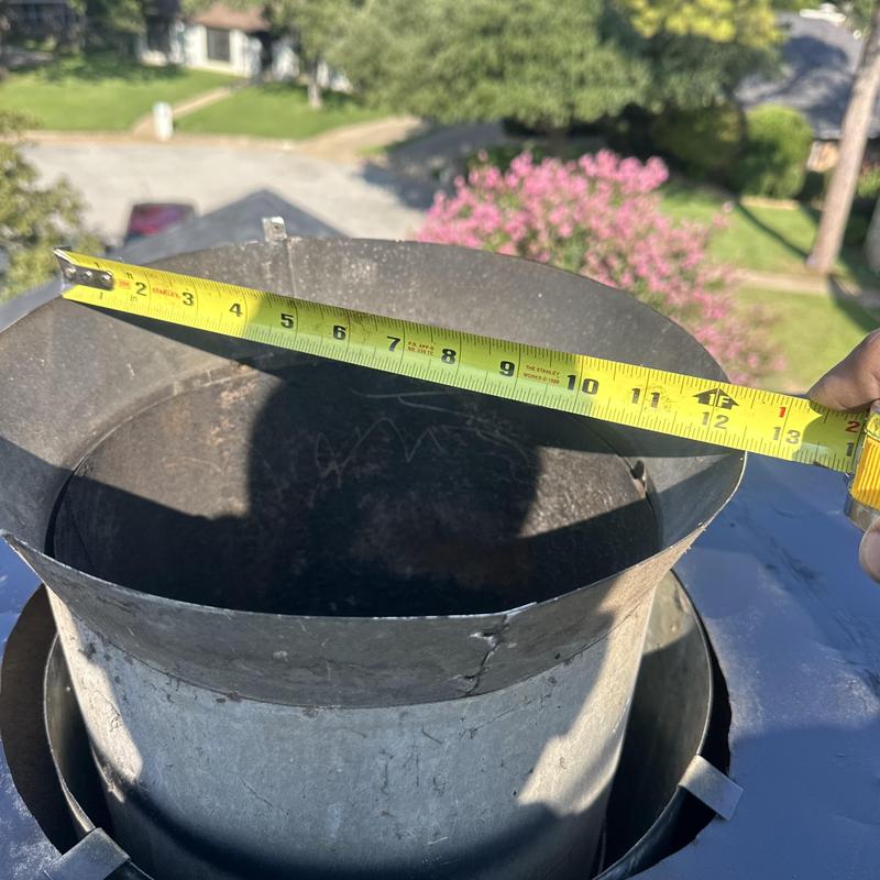Chimney cap diameter measurement with tape measure