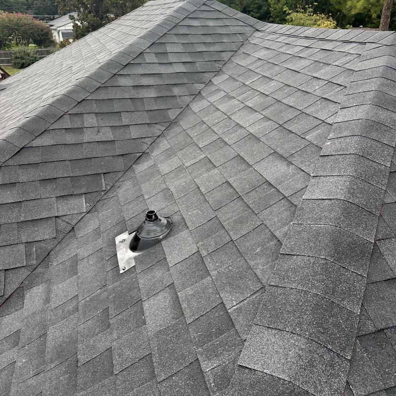 Onyx black Owens Corning three-dimensional roof shingles