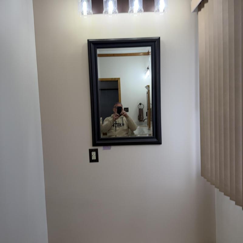 Bathroom mirror with black frame installation