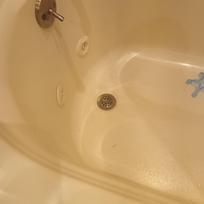 Bathtub drain and jets in bathroom tub Bathtub drain and jets in bathroom tub