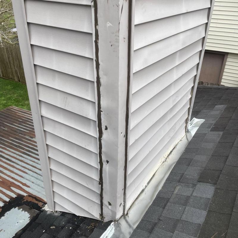 Step and apron metal flashing on roof transition