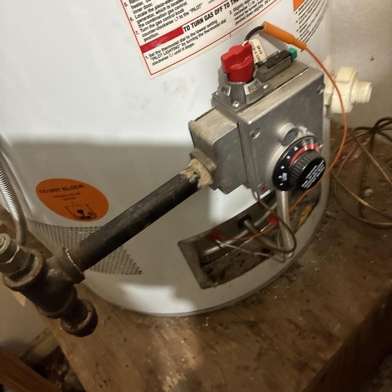 Water heater gas valve and burner assembly close-up