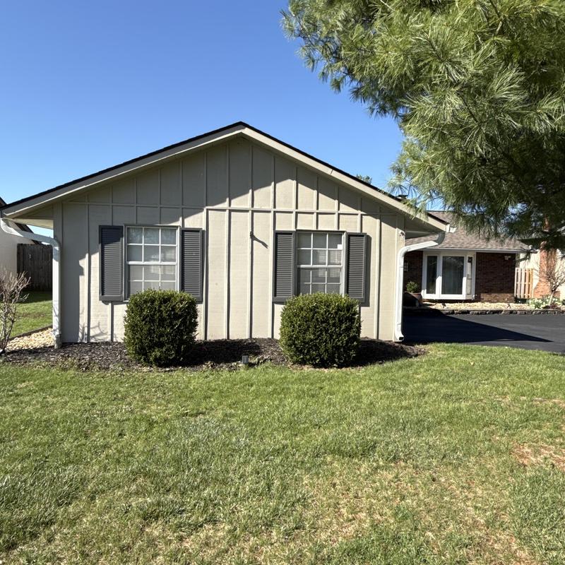 Siding and soffit inspection on residential house exterior Siding and soffit inspection on residential house exterior
