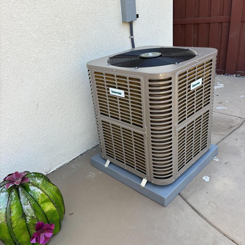 4-ton HVAC condenser unit installed on pad