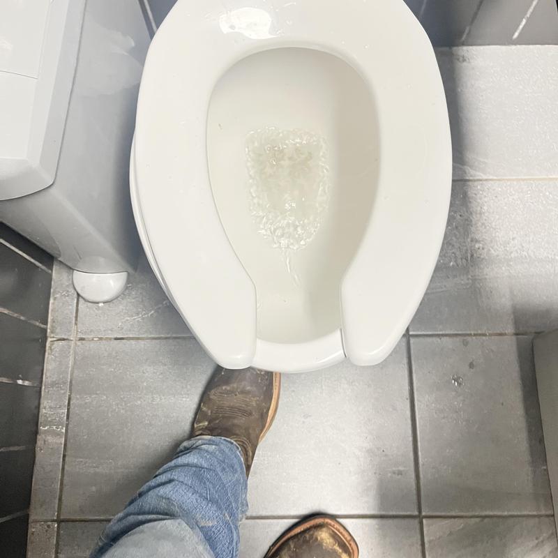Toilet bowl flushing with jetting action