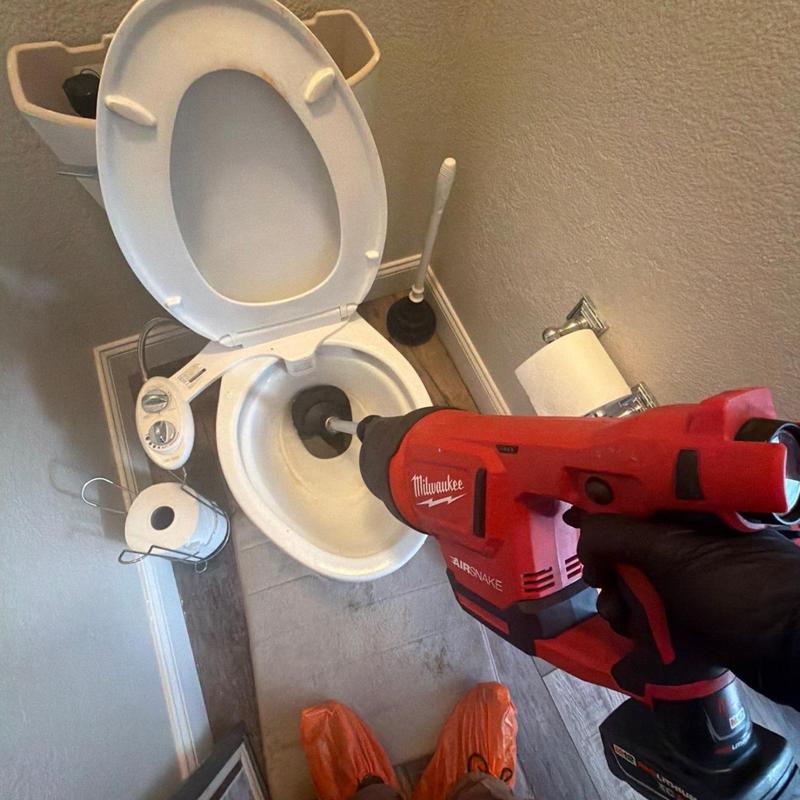 Toilet clog removal using Milwaukee Airsnake tool