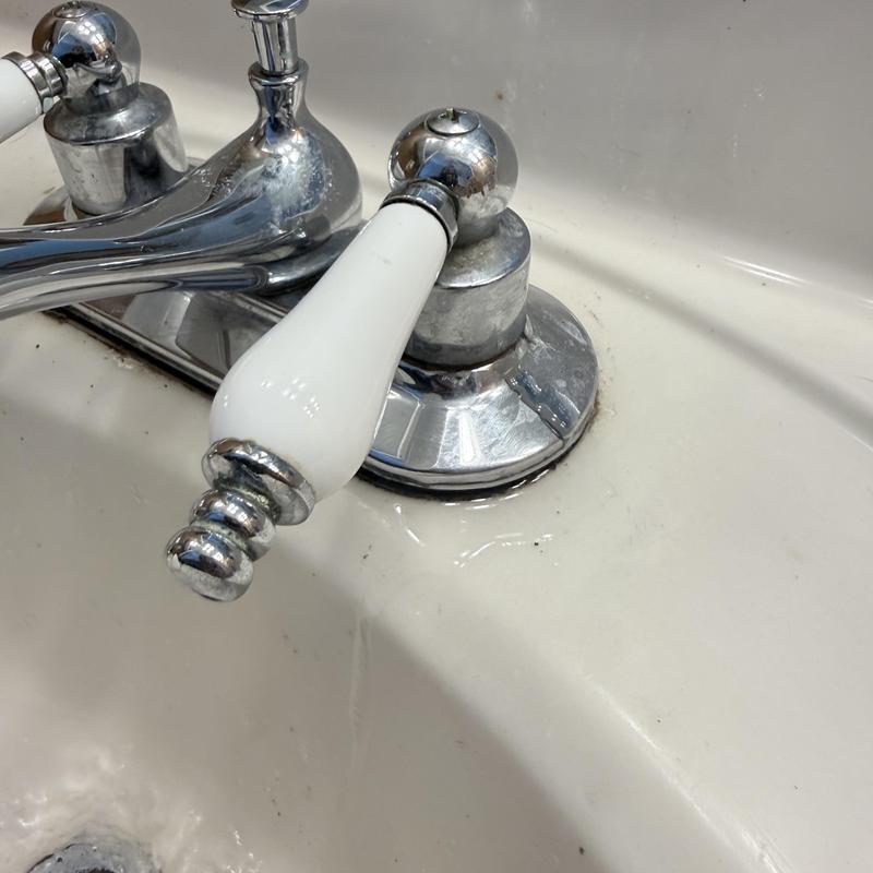 Bathroom sink faucet handle with chrome fixtures Bathroom sink faucet handle with chrome fixtures