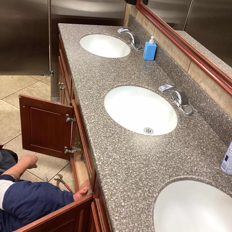 Bathroom sink faucets installation in public restroom