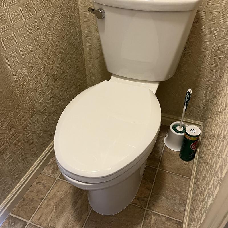 Comfort height elongated toilet with soft-close seat installation Comfort height elongated toilet with soft-close seat installation