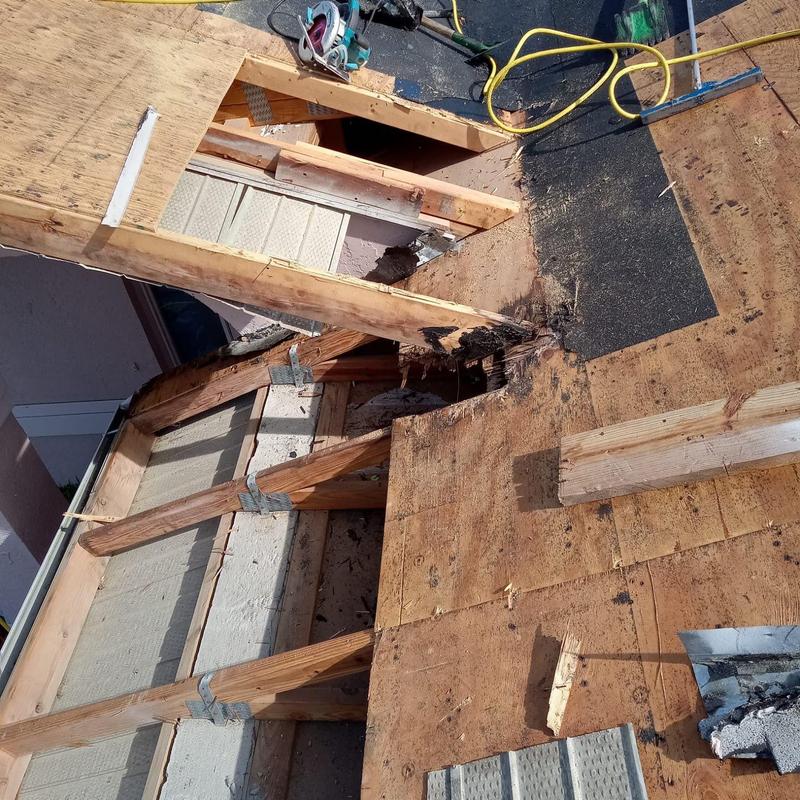 Roof decking and framing with repair materials and tools