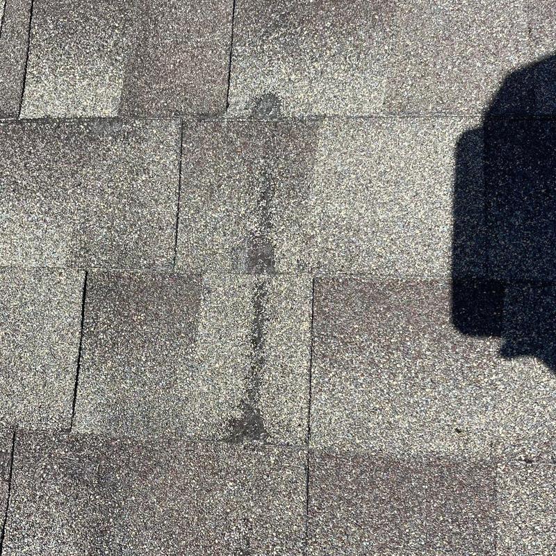 Shingle roof patch sealing old pool solar holes