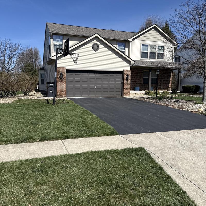 Asphalt driveway resurfacing for residential home Asphalt driveway resurfacing for residential home