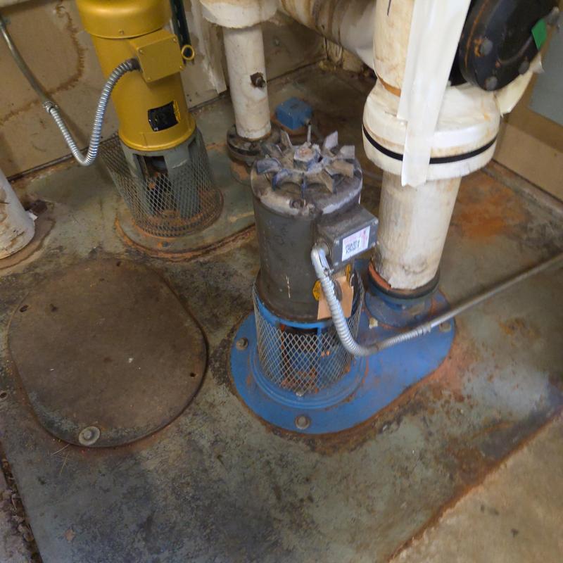 Cooling tower pump motor and piping installation